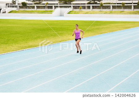 Fitness, sports woman and running on race track for athletics, sprint challenge or competition training in stadium. Runner, exercise and female person for performance, endurance or cardio workout Fitness, sports woman and running on race track for athletics, sprint challenge or competition training in stadium. Runner, exercise and female person for performance, endurance or cardio workout 142004626