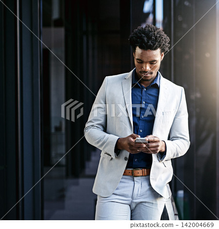 Businessman, typing and balcony with phone for communication, social media or news in city. African man or employee on mobile smartphone app for online chatting, texting or research in an urban town 142004669