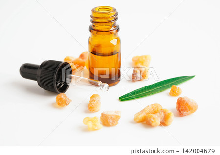 Frankincense or olibanum aromatic resin isolated on white background used in incense and perfumes. Frankincense or olibanum aromatic resin isolated on white background used in incense and perfumes. 142004679