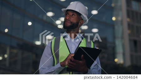 Black man, engineer and thinking at building with tablet for online inspection or safety protocol, architecture or city. Male person, hardhat and project management or construction, internet or night Black man, engineer and thinking at building with tablet for online inspection or safety protocol, architecture or city. Male person, hardhat and project management or construction, internet or night 142004684