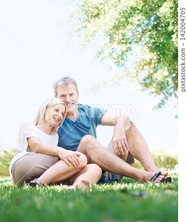 Happy, relax and senior couple in park for bonding, relationship and commitment outdoors on weekend. Portrait, retirement and mature man and woman embrace for romance, love and marriage in nature Happy, relax and senior couple in park for bonding, relationship and commitment outdoors on weekend. Portrait, retirement and mature man and woman embrace for romance, love and marriage in nature 142004705