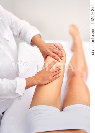 Woman, spa and leg massage for treatment, health and physical therapy for wellbeing break. Lady, detox and muscle wellness for body care, stress relief and zen for peaceful beauty or skincare Woman, spa and leg massage for treatment, health and physical therapy for wellbeing break. Lady, detox and muscle wellness for body care, stress relief and zen for peaceful beauty or skincare 142004835