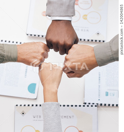 Fist bump, deal or business people in meeting with teamwork for mission, collaboration or community. Hands, group partnership or above of designers with support, portfolio or project documents Fist bump, deal or business people in meeting with teamwork for mission, collaboration or community. Hands, group partnership or above of designers with support, portfolio or project documents 142004865
