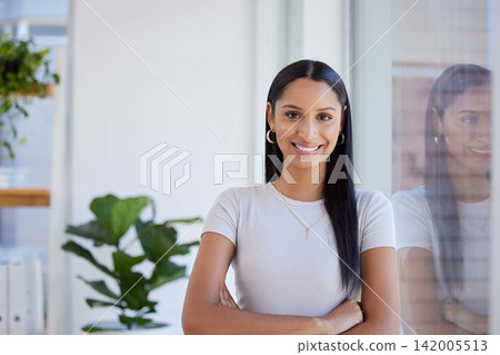 Portrait, smile and business woman with arms crossed in office for career, job or pride in startup company in Dubai. Face, confident professional and happy creative entrepreneur, worker or editor Portrait, smile and business woman with arms crossed in office for career, job or pride in startup company in Dubai. Face, confident professional and happy creative entrepreneur, worker or editor 142005513