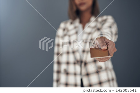 Hand, business woman and credit card for payment, corporate finance or entrepreneur with capital investment. Financial transaction, banking with professional funding and fees on grey background Hand, business woman and credit card for payment, corporate finance or entrepreneur with capital investment. Financial transaction, banking with professional funding and fees on grey background 142005541