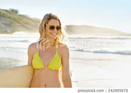 Surfboard, happy and woman on seaside or beach for vacation, peace and blue sky in summer. Surfer, adventure and bikini holiday with sunglasses in Hawaii, relaxing or sports as hobby by ocean Surfboard, happy and woman on seaside or beach for vacation, peace and blue sky in summer. Surfer, adventure and bikini holiday with sunglasses in Hawaii, relaxing or sports as hobby by ocean 142005678