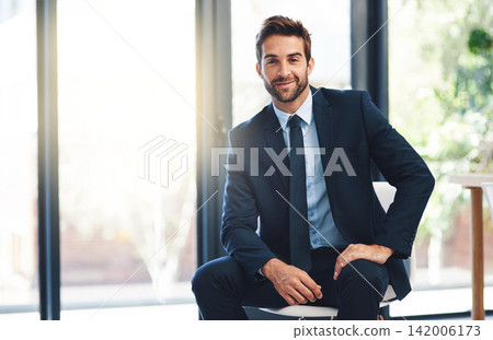 Businessman, pride and chair in office with portrait for ambition, success and career mindset. Corporate person, suit and power in workplace for vision, startup and company mission with happiness 142006173