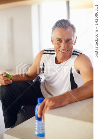 Mature man, portrait and smile for workout, fitness and wellness for health and smile. Guy, apple and water for food, nutrition and hydration with diet happiness and training for cardio exercise Mature man, portrait and smile for workout, fitness and wellness for health and smile. Guy, apple and water for food, nutrition and hydration with diet happiness and training for cardio exercise 142006311
