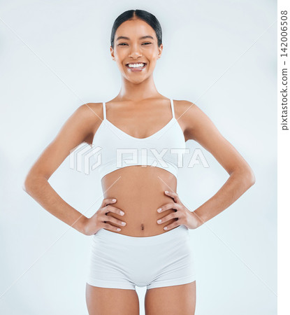 Woman, portrait and underwear with smile in studio or beaut, weight loss or white background. Female person, model and happiness with skincare confidence for self care wellness, fitness or exercise Woman, portrait and underwear with smile in studio or beaut, weight loss or white background. Female person, model and happiness with skincare confidence for self care wellness, fitness or exercise 142006508