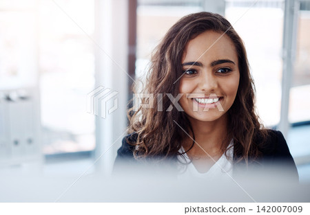 Businesswoman, smile and office with computer as web developer in information technology for company. Female person, employee and designer for business in workplace for online, creative and happy Businesswoman, smile and office with computer as web developer in information technology for company. Female person, employee and designer for business in workplace for online, creative and happy 142007009