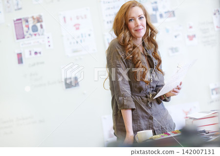 Portrait, document and business woman in office at workplace for career, job or magazine editor in Switzerland. Design, entrepreneur or face of professional with paperwork in creative startup company 142007131
