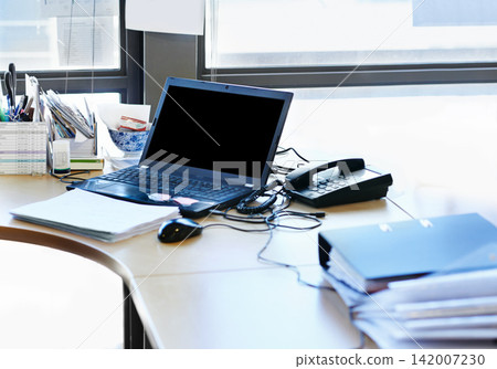 Laptop, desk and files on table for accounting, marketing and online company in workplace. Administration, computer and paperwork on desk for documents, business and email in office for working. 142007230