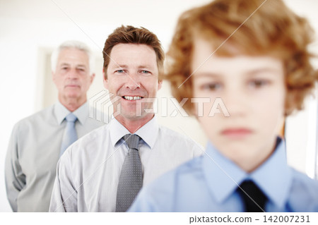 Father, grandfather and kid in portrait at home with love, care and support or bonding. Family business, generation and face of boy heir with men in house for learning, security or future inheritance Father, grandfather and kid in portrait at home with love, care and support or bonding. Family business, generation and face of boy heir with men in house for learning, security or future inheritance 142007231