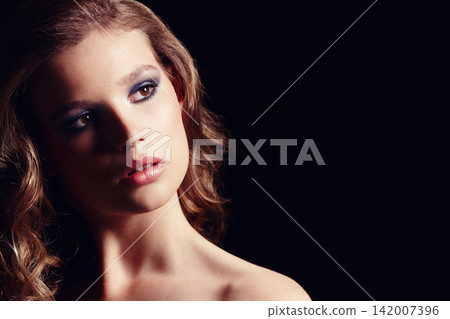 Confident, woman and makeup for cosmetics in studio with eyeshadow, satisfaction and natural beauty. Lady, elegant and glow, skincare and self love for healthy skin isolated on black background 142007396