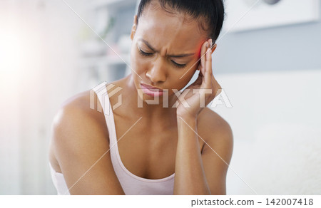 Black woman, pain and headache pressure in home with red overlay for brain fog, vertigo or migraine. Female person, hands and stress inflammation for fatigue or mental health anxiety, tension or hurt Black woman, pain and headache pressure in home with red overlay for brain fog, vertigo or migraine. Female person, hands and stress inflammation for fatigue or mental health anxiety, tension or hurt 142007418