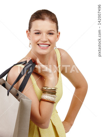 Woman, shopping bag and portrait in studio for fashion, discount or spring sale with beauty and smile.Young person, customer or model with retail cosmetics, package and luxury on a white background Woman, shopping bag and portrait in studio for fashion, discount or spring sale with beauty and smile.Young person, customer or model with retail cosmetics, package and luxury on a white background 142007496