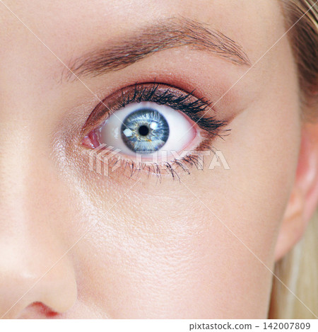 Cosmetic, beauty and blue eye with natural iris color for long eyelashes and mascara. Makeup, optical and closeup of awake woman with vision, sight and eyecare for dilating pupil for optometry. Cosmetic, beauty and blue eye with natural iris color for long eyelashes and mascara. Makeup, optical and closeup of awake woman with vision, sight and eyecare for dilating pupil for optometry. 142007809