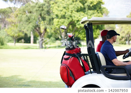 Men, friends and driving golf cart on outdoor field for fitness, clubs and people for sport or exercise. Golfer, athlete and vehicle on green grass for workout, fun and transportation on arena Men, friends and driving golf cart on outdoor field for fitness, clubs and people for sport or exercise. Golfer, athlete and vehicle on green grass for workout, fun and transportation on arena 142007950
