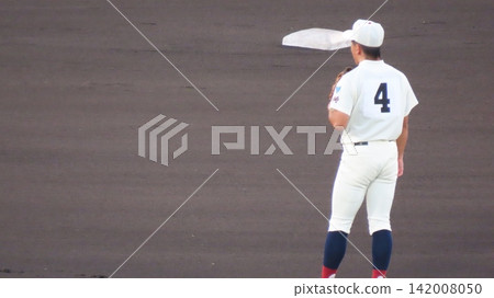 High school baseball player with jersey number 4 High school baseball player with jersey number 4 142008050