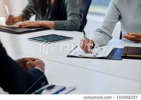 Business people, meeting and closeup with documents and charts for work performance review at desk. Corporate group, discussion and paperwork with graph, statistics and analysis of employee results Business people, meeting and closeup with documents and charts for work performance review at desk. Corporate group, discussion and paperwork with graph, statistics and analysis of employee results 142008207