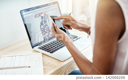 Phone, laptop and office in small business with fashion dropshipping, ecommerce and sales logistics. Online shopping, app and planning supply chain, delivery or communication with client and seller Phone, laptop and office in small business with fashion dropshipping, ecommerce and sales logistics. Online shopping, app and planning supply chain, delivery or communication with client and seller 142008208