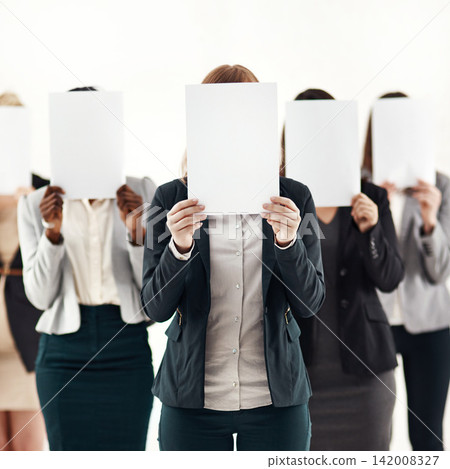 Businesswoman, team and message on blank board in studio for anonymous recruitment of career. Professional, group and female people with empty paper hiding face for marketing as brand ambassador 142008327