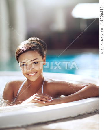 Portrait, woman and relax with smile in pool on holiday, break and luxury or mindfulness. Female person, jacuzzi and happy or satisfied on vacation, trip and travel at hotel or resort for swimming Portrait, woman and relax with smile in pool on holiday, break and luxury or mindfulness. Female person, jacuzzi and happy or satisfied on vacation, trip and travel at hotel or resort for swimming 142008344