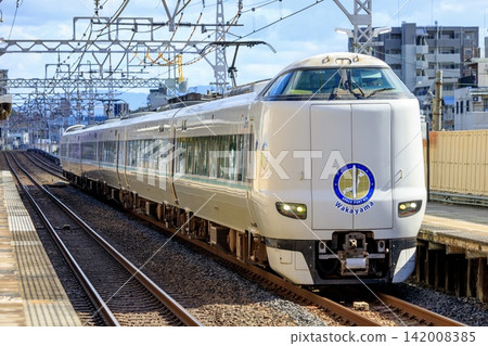 The Limited Express Kuroshio (Rocket Kairos livery) passing through Bishōen Station on the Hanwa Line. The Limited Express Kuroshio (Rocket Kairos livery) passing through Bishōen Station on the Hanwa Line. 142008385