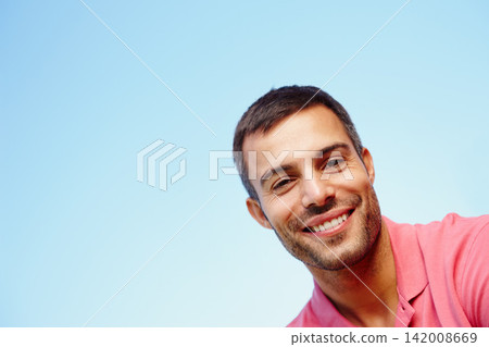 Man, portrait and smile by blue sky on holiday, peace and freedom on weekend trip. Happy male person, mockup space and tourist face for travel and relax in outdoor nature, getaway and summer vacation Man, portrait and smile by blue sky on holiday, peace and freedom on weekend trip. Happy male person, mockup space and tourist face for travel and relax in outdoor nature, getaway and summer vacation 142008669