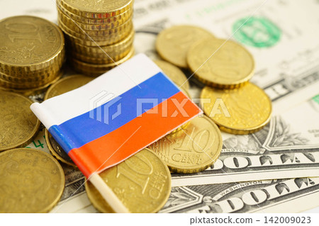 Russia flag on coin and banknote money, finance trading investment business currency concept. Russia flag on coin and banknote money, finance trading investment business currency concept. 142009023