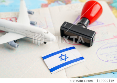 Israel passport with approved stamp on document for tourism to immigration at airport in country. Israel passport with approved stamp on document for tourism to immigration at airport in country. 142009156