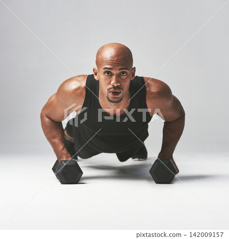 Plank, portrait and black man with dumbbells for fitness, exercise and wellness for sport isolate on white background. Commitment, training and athlete with motivation for workout, health and cardio Plank, portrait and black man with dumbbells for fitness, exercise and wellness for sport isolate on white background. Commitment, training and athlete with motivation for workout, health and cardio 142009157