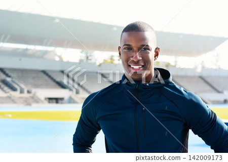 Portrait, black man and happy athlete at stadium for sport, wellness or exercise for body health in Kenya. Face, smile and African runner at race track for fitness, workout or person training outdoor Portrait, black man and happy athlete at stadium for sport, wellness or exercise for body health in Kenya. Face, smile and African runner at race track for fitness, workout or person training outdoor 142009173