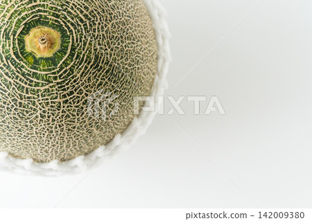 Miura Melon: A beautiful, fine net pattern with a striking green contrast. A summer photo of this premium fruit. Miura Melon: A beautiful, fine net pattern with a striking green contrast. A summer photo of this premium fruit. 142009380