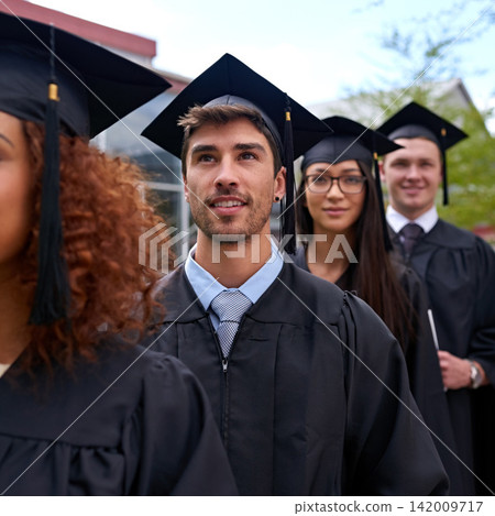 Education, university and students in row for graduation dreaming and thinking of future. Smile, waiting and group of young people in line for college degree, diploma or certificate by campus. Education, university and students in row for graduation dreaming and thinking of future. Smile, waiting and group of young people in line for college degree, diploma or certificate by campus. 142009717