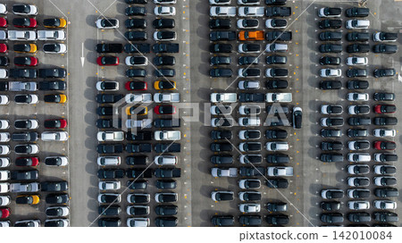 Aerial view new car lined up, Automobile automotive car parking lot commercial business industry, Port of import export business logistic dealership, New cars global business logistic import export. Aerial view new car lined up, Automobile automotive car parking lot commercial business industry, Port of import export business logistic dealership, New cars global business logistic import export. 142010084