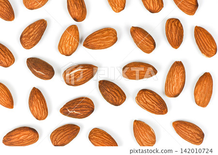 Almonds seamless texture background / Close up almond nuts natural protein food and for snack Almonds seamless texture background / Close up almond nuts natural protein food and for snack 142010724
