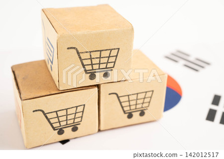 Online shopping, Shopping cart box on South Korea flag, import export, finance commerce. Online shopping, Shopping cart box on South Korea flag, import export, finance commerce. 142012517