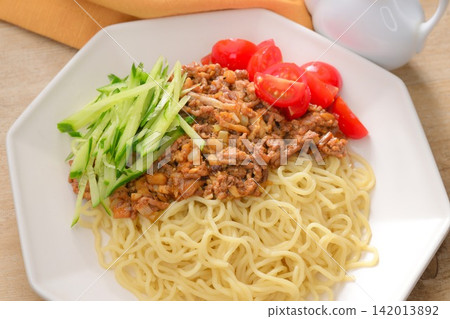 A reboot of Jajangmyeon. Toppings include cucumber and cherry tomatoes, and the meat sauce now includes silken tofu and chopped pickles. A reboot of Jajangmyeon. Toppings include cucumber and cherry tomatoes, and the meat sauce now includes silken tofu and chopped pickles. 142013892