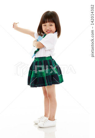 Creative little girl in school uniform holding brush and palette imagining painting Creative little girl in school uniform holding brush and palette imagining painting 142014382