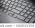 computer keyboard close up. Gaming laptop keyboard background. Enter key 142015358