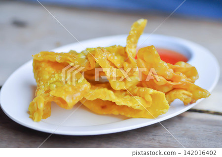 fried wonton, deep fried wonton or fried dumpling or deep fried dumpling and dip fried wonton, deep fried wonton or fried dumpling or deep fried dumpling and dip 142016402