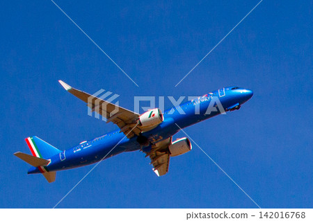 ITA Airways Airbus Airplane Taking Off into Blue Sky at Brussels Airport ITA Airways Airbus Airplane Taking Off into Blue Sky at Brussels Airport 142016768