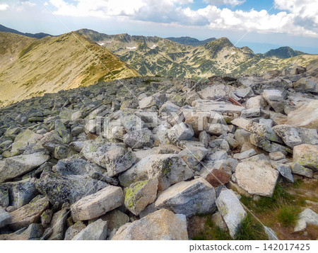 Todorka Pirin Mountains Bulgaria rugged granite rocks boulders and alpine hiking trail near Bansko Todorka Pirin Mountains Bulgaria rugged granite rocks boulders and alpine hiking trail near Bansko 142017425