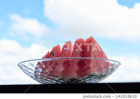 Watermelon served on a glass plate Watermelon served on a glass plate 142018610