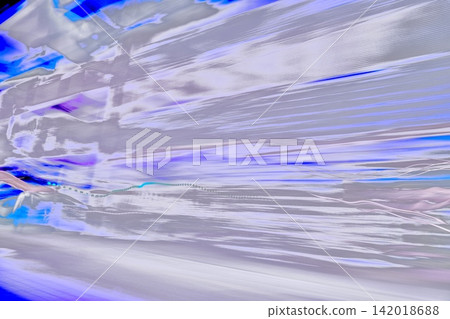 Abstract speed background with flowing blue and silver light. Abstract speed background with flowing blue and silver light. 142018688