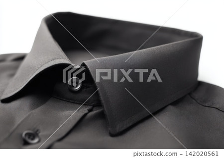 Slim pointed collar made of black cotton fabric on a white background Slim pointed collar made of black cotton fabric on a white background 142020561