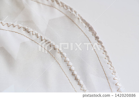 Fabric seams and zigzag stitching Fabric seams and zigzag stitching 142020886
