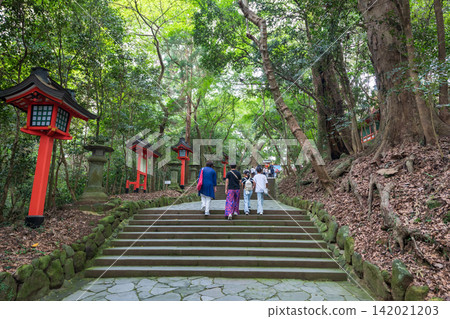 Tourists walk on staircases to visit Usa Jingu shrine, Oita, Japan Tourists walk on staircases to visit Usa Jingu shrine, Oita, Japan 142021203