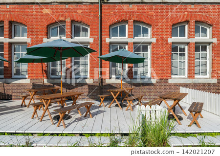 cafe patio by Western style brick building at in Mojiko Retro Town, Kitakyushu cafe patio by Western style brick building at in Mojiko Retro Town, Kitakyushu 142021207